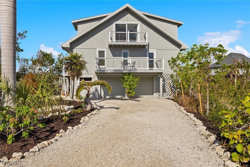 This raised 3-bedroom, 2-bath lake-view home in the popular Gulf - Beach Home for sale in Sanibel, Florida on Beachhouse.com