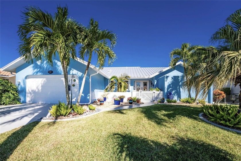 WHERE COTTAGE CHARM MEETS COASTAL LIVING This meticulously kept - Beach Home for sale in Punta Gorda, Florida on Beachhouse.com