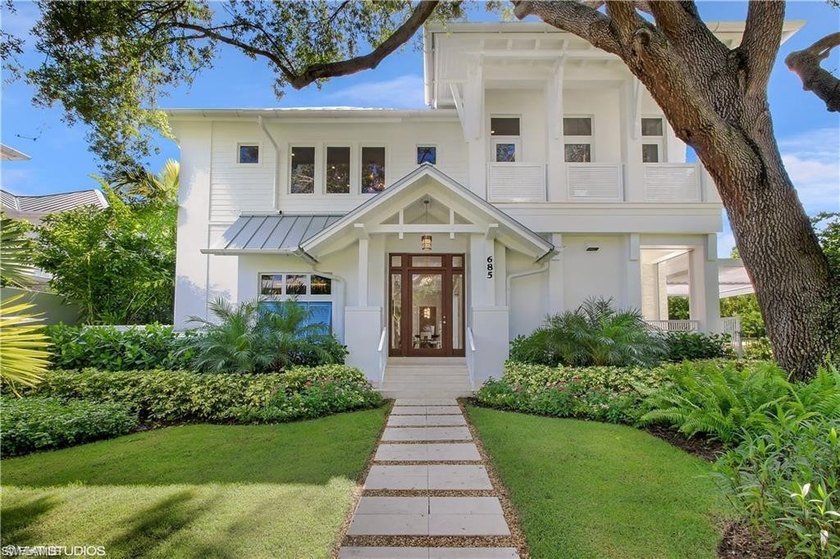 Perfectly positioned on a coveted corner of 2nd Street South and - Beach Home for sale in Naples, Florida on Beachhouse.com