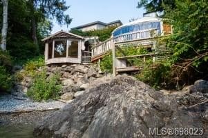 Perched on a cliff overlooking the ocean in a private cove - Beach Home for sale in Tofino,  on Beachhouse.com