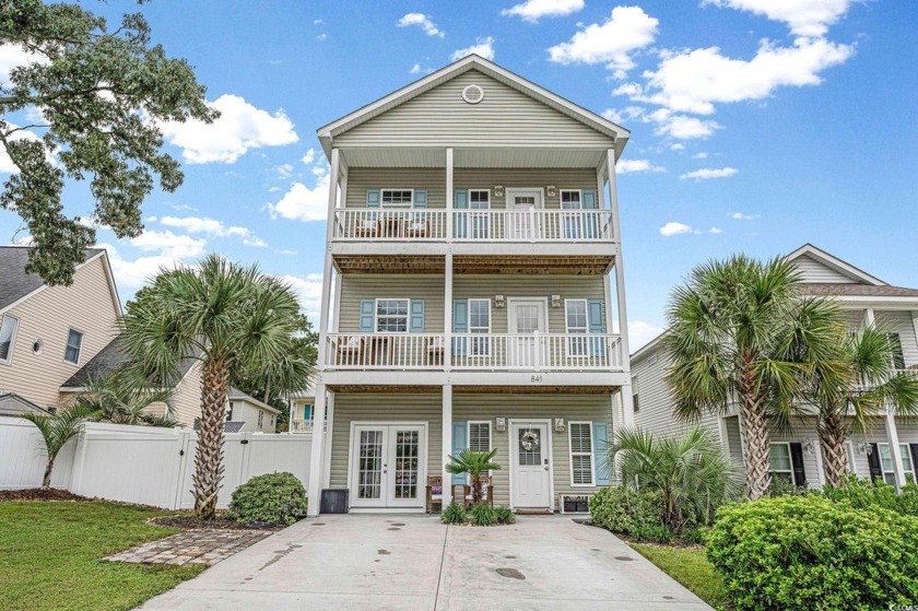This beautiful 3-story home; situated just a few blocks from the - Beach Home for sale in North Myrtle Beach, South Carolina on Beachhouse.com