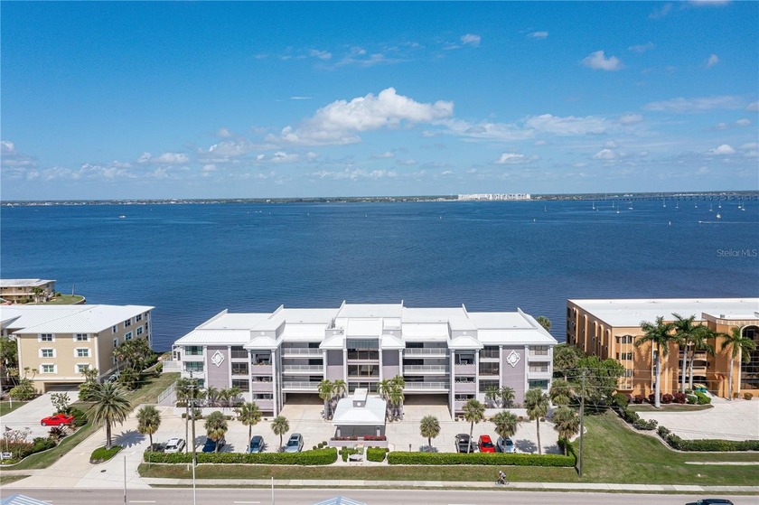 HARBOR FRONT CONDO W/PANORAMIC VIEWS IN PUNTA GORDA ISLES! Live - Beach Condo for sale in Punta Gorda, Florida on Beachhouse.com