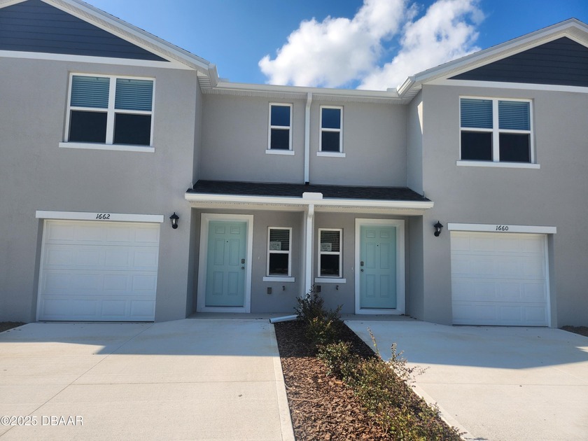 Introducing the Pearson townhome in Sandalwood, offering modern - Beach Townhome/Townhouse for sale in New Smyrna Beach, Florida on Beachhouse.com