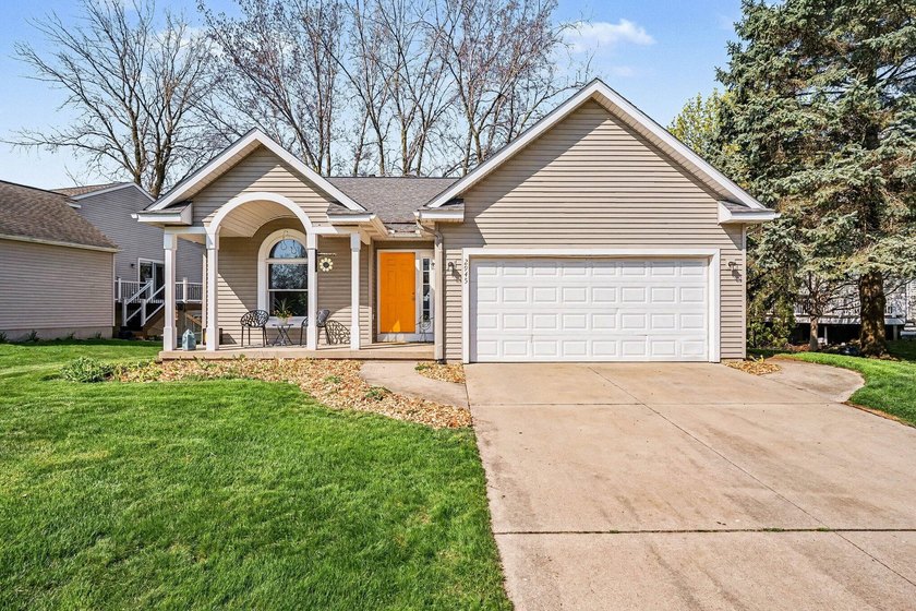Beautiful ranch home on the pond in Riley Ridge. The living room - Beach Home for sale in Holland, Michigan on Beachhouse.com