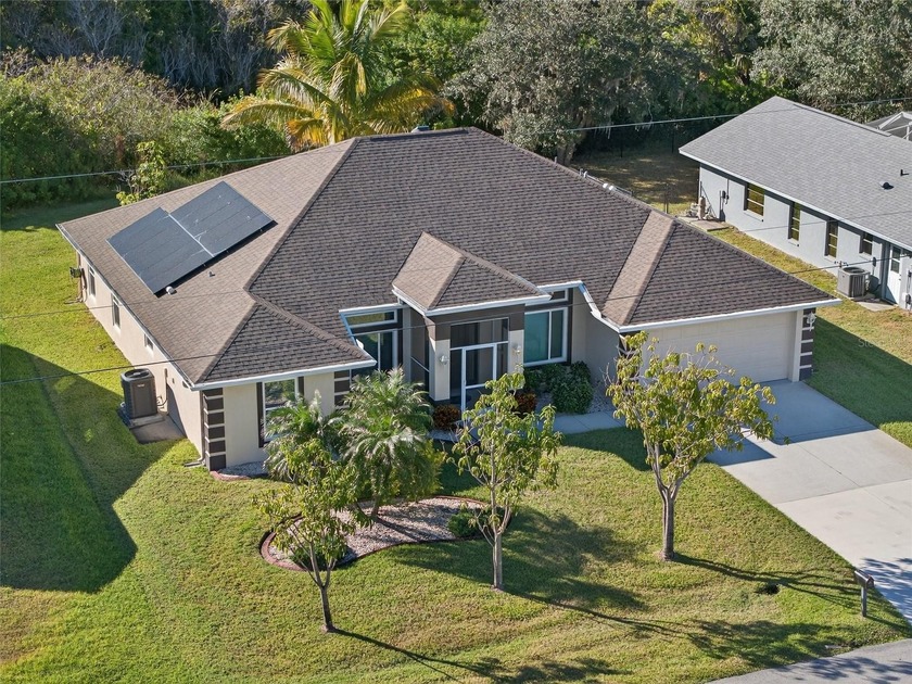 DEEP CREEK! IMPRESSIVE 4 BEDROOM, 2 BATH, 2 CAR GARAGE GREENBELT - Beach Home for sale in Punta Gorda, Florida on Beachhouse.com