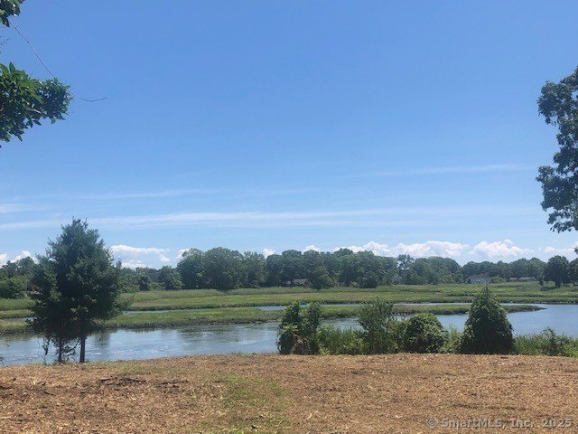 Discover breathtaking views of the Branford River and its - Beach Lot for sale in Branford, Connecticut on Beachhouse.com