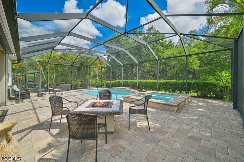 Tucked into the heart of Estero, this exceptional residence - Beach Home for sale in Estero, Florida on Beachhouse.com