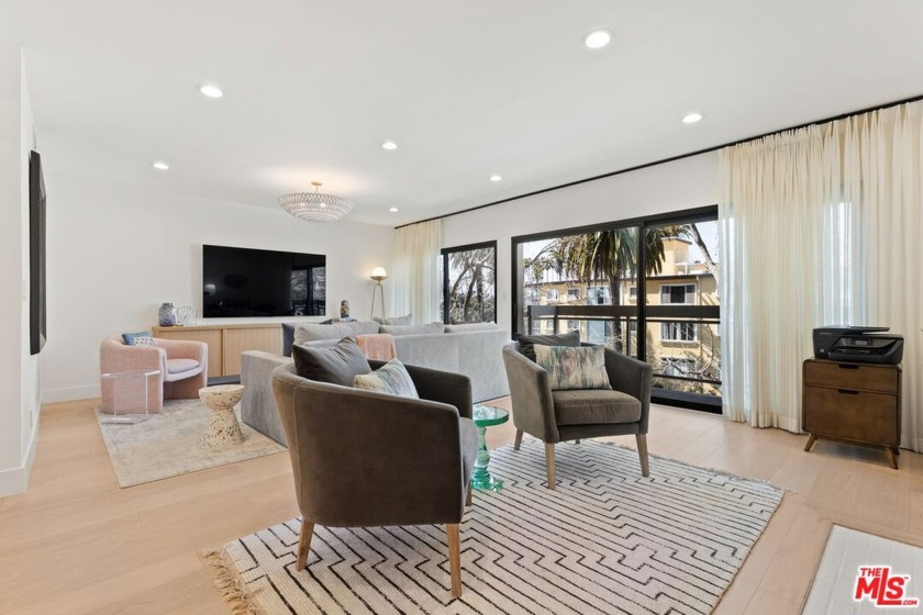 Completely reimagined with an exceptional remodel, this - Beach Condo for sale in Santa Monica, California on Beachhouse.com