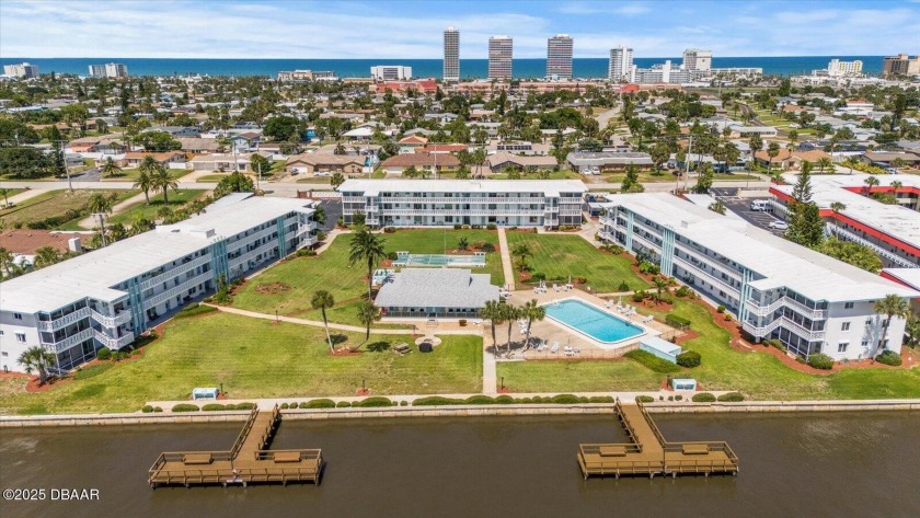 Paradise awaits in this fully remodeled, direct riverfront 2 - Beach Condo for sale in Daytona Beach, Florida on Beachhouse.com