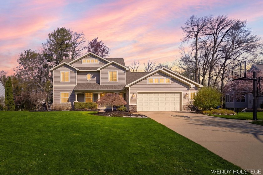 Step into this vibrant 6-bed, 3.5-bath, 3,778 sq ft home in - Beach Home for sale in Holland, Michigan on Beachhouse.com