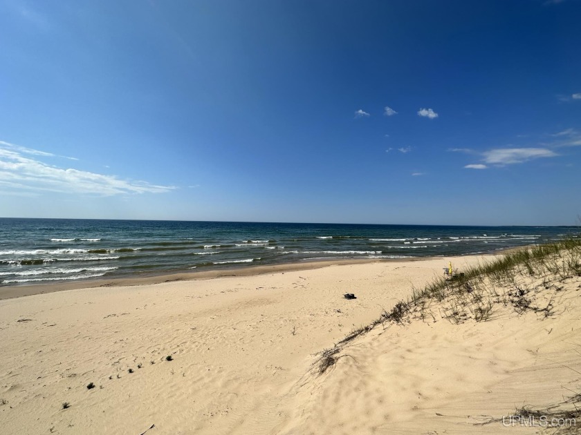 7 miles of Michigan's best sand beach await you at this amazing - Beach Lot for sale in Manistique, Michigan on Beachhouse.com