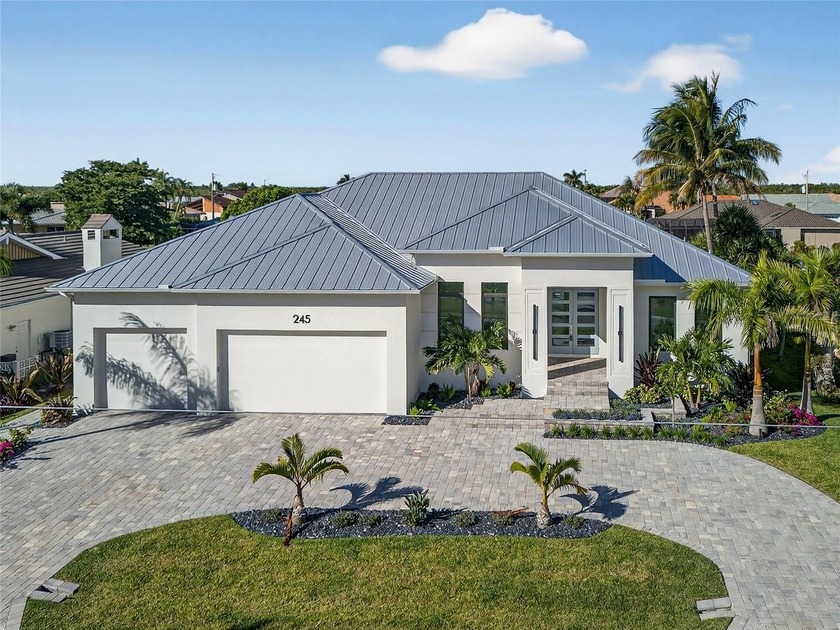 PRIME WATERFRONT LOCATION! BRAND NEW 2025 CUSTOM-BUILT 3 BEDROOM - Beach Home for sale in Punta Gorda, Florida on Beachhouse.com