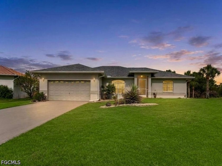 Meticulously maintained HEATED pool home on a beautifully - Beach Home for sale in Lehigh Acres, Florida on Beachhouse.com