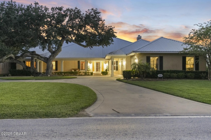 Experience luxurious riverfront living in this striking - Beach Home for sale in Ormond Beach, Florida on Beachhouse.com