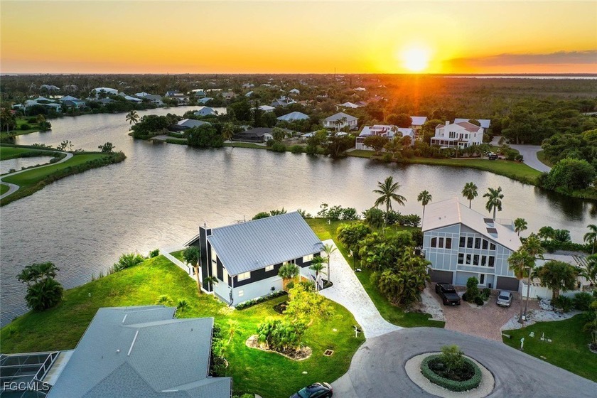 Panoramic lake and golf course views from this elegant island - Beach Home for sale in Sanibel, Florida on Beachhouse.com