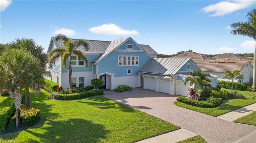 Lakefront and fully FURNISHED for convenience! This 4 bedroom - Beach Home for sale in Naples, Florida on Beachhouse.com