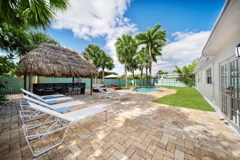 This stunning 4-bedroom, 2-bathroom residence is a true gem - Beach Home for sale in Lake Worth Beach, Florida on Beachhouse.com