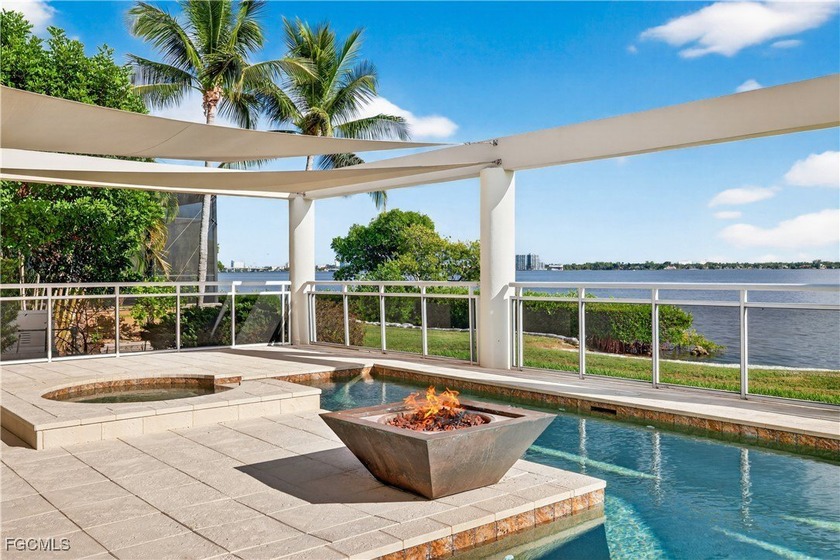 Direct Riverfront Estate in Buttonwood Harbor, a gated luxury - Beach Home for sale in North Fort Myers, Florida on Beachhouse.com
