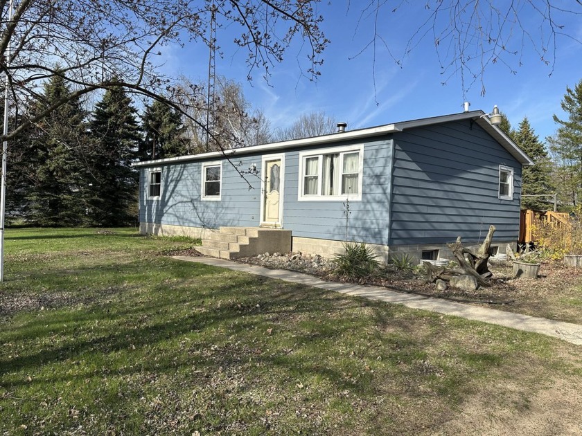 Not far from the excitement of Silver Lake, is this solid 3 - Beach Home for sale in Mears, Michigan on Beachhouse.com