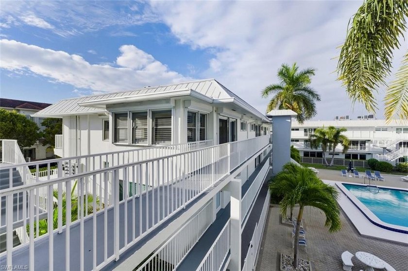 COVERED BOAT SLIP w/ LIFT INCLUDED ($200,000)! Beautiful 2 - Beach Condo for sale in Naples, Florida on Beachhouse.com