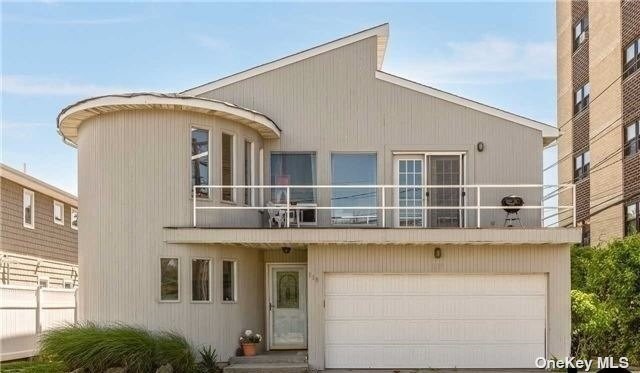 This contemporary home is located just seconds away from the - Beach Home for sale in Long Beach, New York on Beachhouse.com