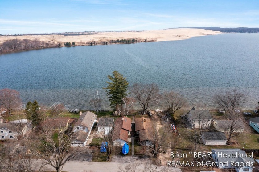 Million-Dollar View--At Half the Price! This rare Silver Lake - Beach Home for sale in Mears, Michigan on Beachhouse.com