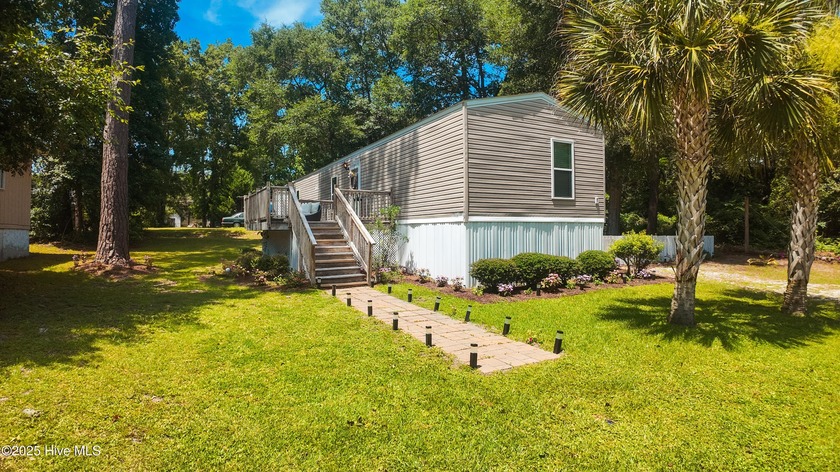Discover the PERFECT LOCATION in a peaceful setting! This home - Beach Home for sale in Ocean Isle Beach, North Carolina on Beachhouse.com