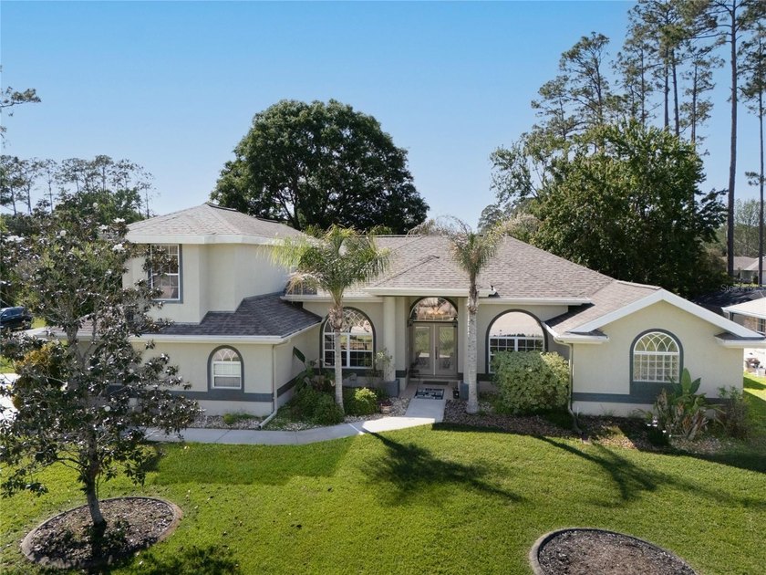 Stunning custom-built pool home located in the desirable - Beach Home for sale in Palm Coast, Florida on Beachhouse.com
