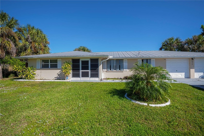 FABULOUS OPPORTUNITY on an Oversized Canal Lot in Serene - Beach Home for sale in Punta Gorda, Florida on Beachhouse.com