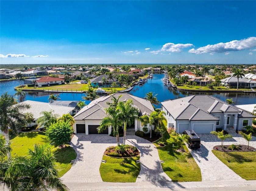 Experience the pinnacle of waterfront luxury in this custom - Beach Home for sale in Punta Gorda, Florida on Beachhouse.com