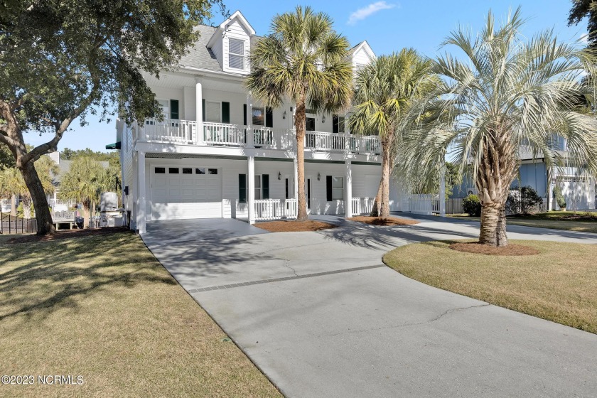 Located within the gated community of Inlet Point Harbor, this - Beach Home for sale in Wilmington, North Carolina on Beachhouse.com