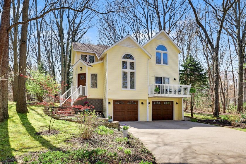 The perfect retreat! Nestled on just under an acre at the end of - Beach Home for sale in Saugatuck, Michigan on Beachhouse.com