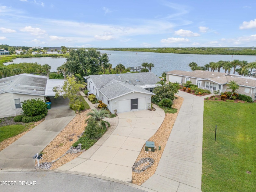 Experience the best of Florida waterfront living in this - Beach Home for sale in Oak Hill, Florida on Beachhouse.com