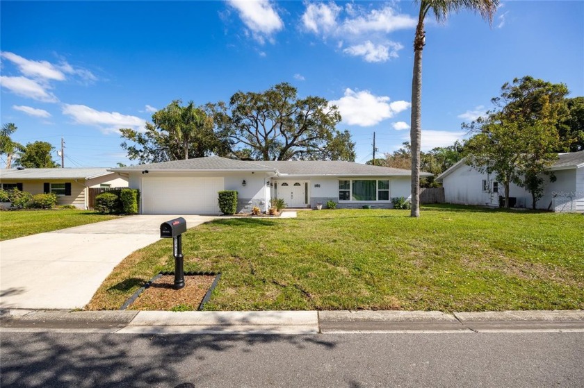 This spacious 3-bedroom, 2-bathroom home in Fairway Estates - Beach Home for sale in Dunedin, Florida on Beachhouse.com