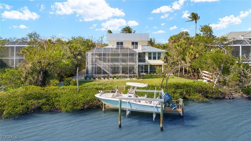 Stunning Waterfront Elevated 3-Story Home with Breathtaking - Beach Home for sale in Sanibel, Florida on Beachhouse.com