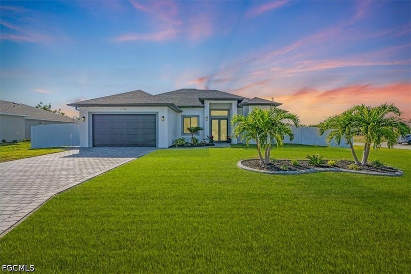 Beautifully upgraded 2022-built pool home situated on a spacious - Beach Home for sale in Cape Coral, Florida on Beachhouse.com