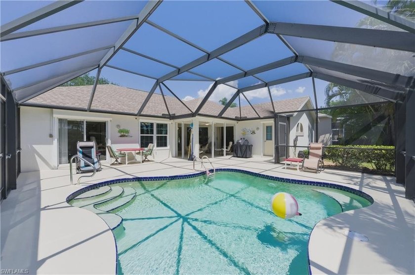 Tucked away on a quiet cul-de-sac in the desirable Country Creek - Beach Home for sale in Estero, Florida on Beachhouse.com