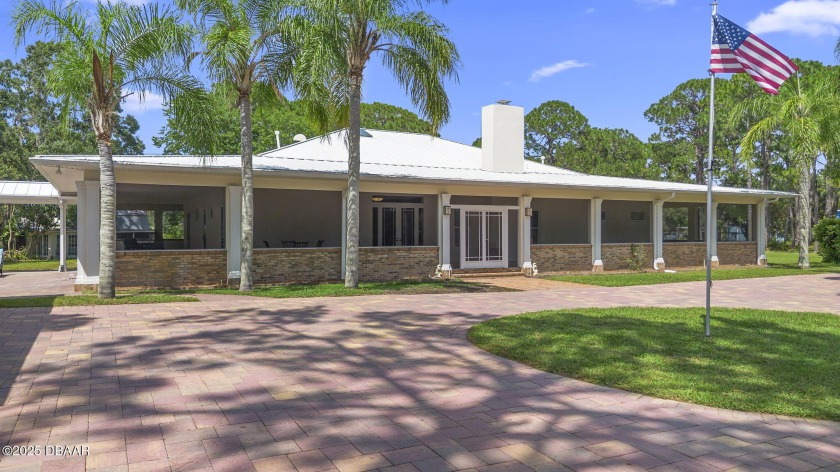 Step into timeless elegance where a custom-designed, fully - Beach Home for sale in New Smyrna Beach, Florida on Beachhouse.com