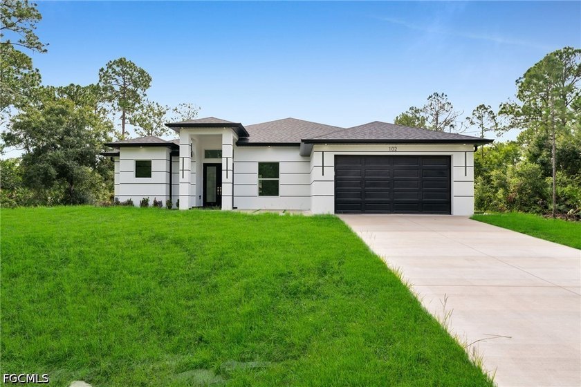 Welcome to your dream home in the heart of Lehigh Acres! This - Beach Home for sale in Lehigh Acres, Florida on Beachhouse.com