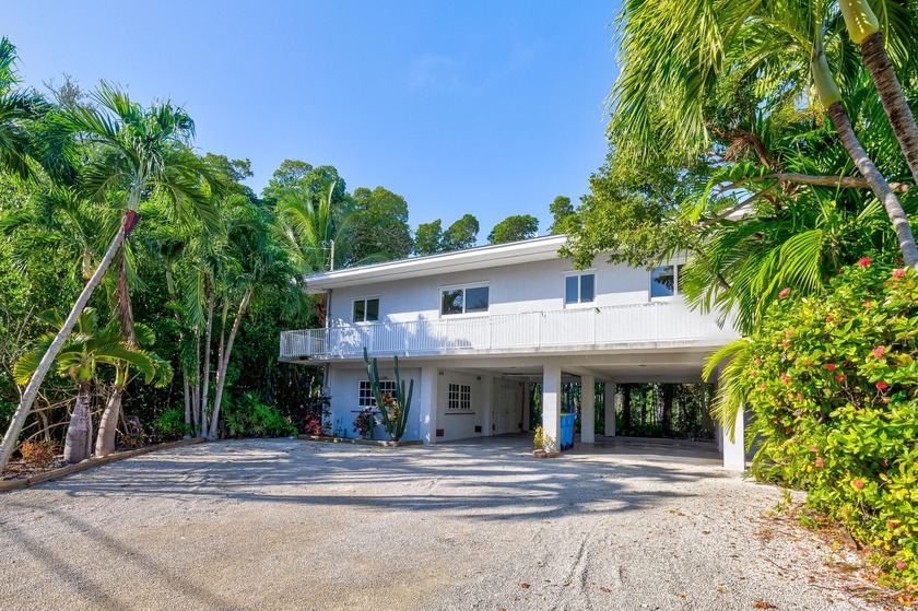 Come see this very private, 3 bedroom, 2 bath, two story - Beach Home for sale in Plantation Key, Florida on Beachhouse.com