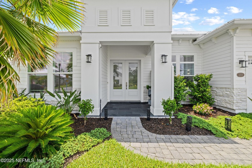 This elegant 4-bedroom, 3.5-bath home is located in the gated - Beach Home for sale in Saint Johns, Florida on Beachhouse.com
