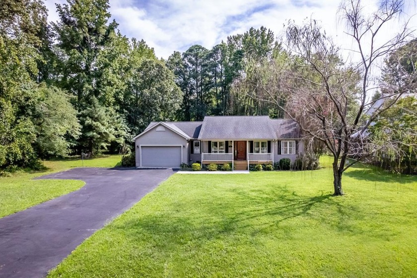 Nestled on a picturesque 0.75-acre lot, this charming one-story - Beach Home for sale in Montross, Virginia on Beachhouse.com