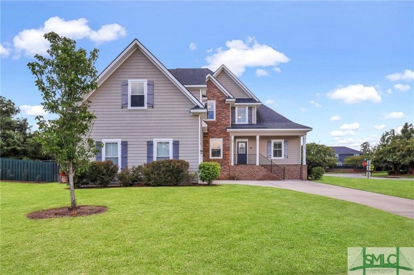 Step into this exquisitely spacious former model home! Revel in - Beach Home for sale in Richmond Hill, Georgia on Beachhouse.com