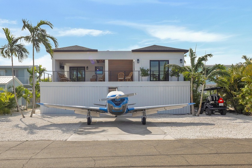 A rare aviation-and-waterfront opportunity in the private - Beach Home for sale in Summerland Key, Florida on Beachhouse.com