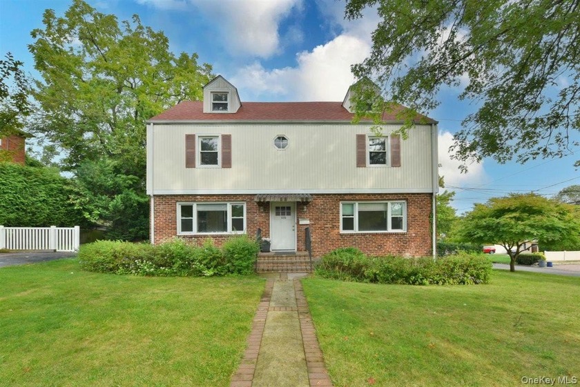 Set on a quiet street in Great Neck, this home brings space - Beach Home for sale in Great Neck, New York on Beachhouse.com