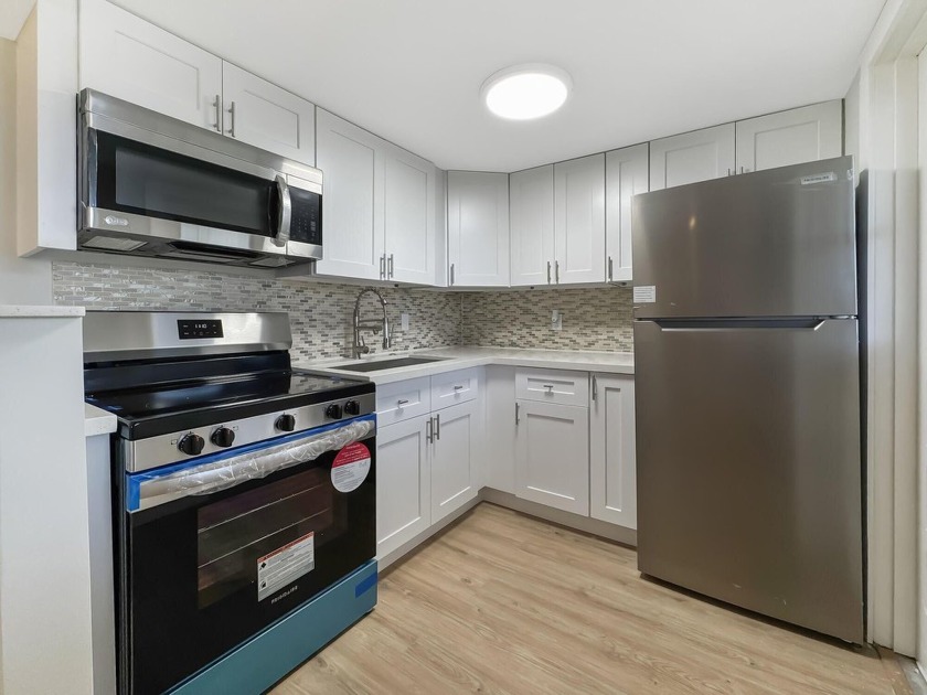 Get ready to fall in LOVE! This JUST RENOVATED one Bedroom, 1.5 - Beach Condo for sale in Boynton Beach, Florida on Beachhouse.com