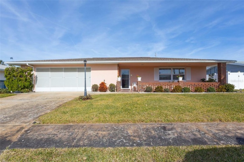 Nestled between the Atlantic Ocean and the Halifax River, this - Beach Home for sale in Ormond Beach, Florida on Beachhouse.com