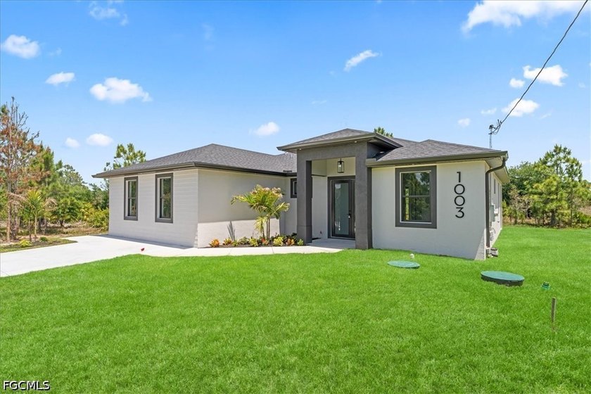 Welcome to this stunning new construction home in Lehigh Acres - Beach Home for sale in Lehigh Acres, Florida on Beachhouse.com