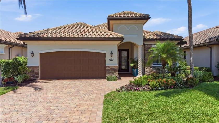 RENOVATED l TURNKEY l GENERATOR l IMPACT WINDOWS l SWEEPING LAKE - Beach Home for sale in Naples, Florida on Beachhouse.com