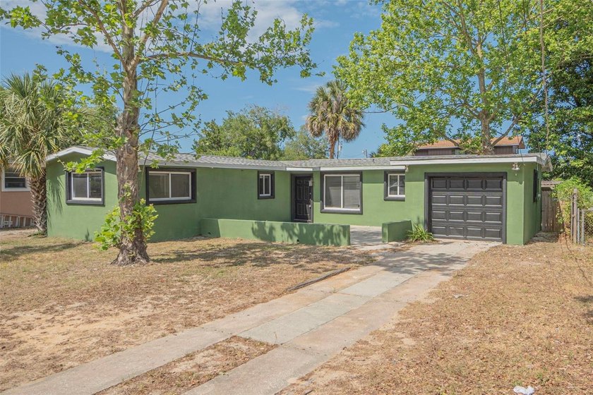 Welcome to this beautifully updated concrete block home in the - Beach Home for sale in Daytona Beach, Florida on Beachhouse.com